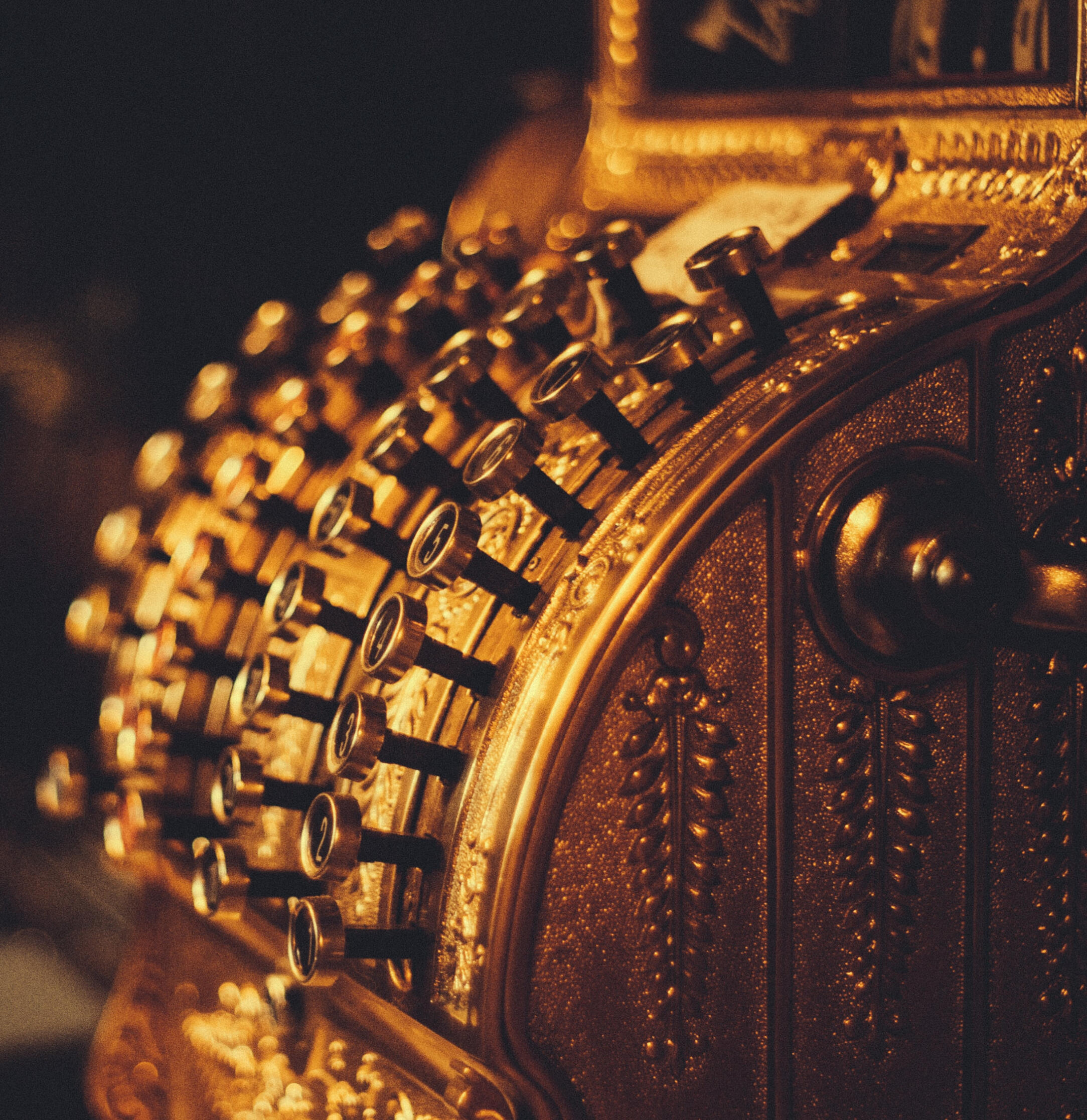 An all-gold antique cash register.
